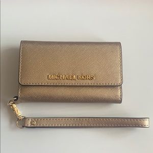 Michael Kors wallet and iPhone 5s case